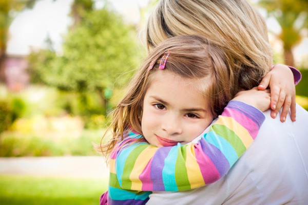 mom-hugging-sensitive-little-girl